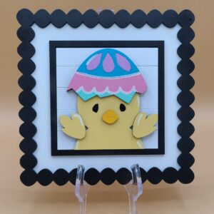 Chick with egg on head