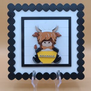 Highland sitting with baking bowl