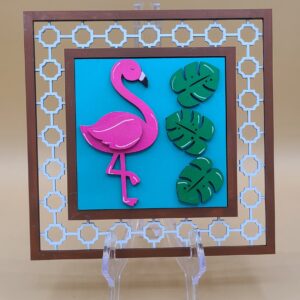 Flamingo with 3 palm leaves