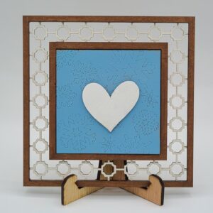 Heart on snowflake background